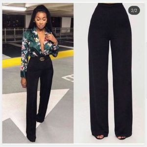 Black high-waist women’s palazzo pants with wide-leg design, styled for formal and casual outfits.
