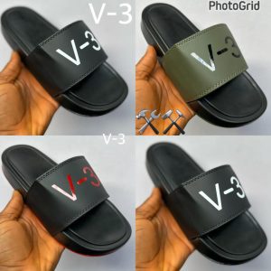 Front view of men’s slide slippers showing strap design