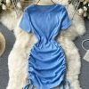 Front view of short sleeve ruched bodycon mini dress