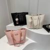 Water ripple stitched tote bag front view showing texture