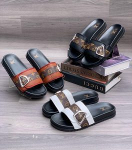 Louis Vuitton-inspired women's slide slippers with monogram strap and buckle in brown, black, and white