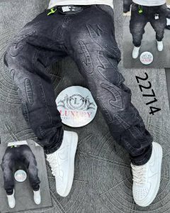: Men’s black baggy denim jeans with raised handprint design front view