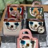 Lumi Pink London handbag collection front display