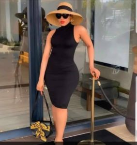 Sleeveless bodycon gown with a fitted silhouette displayed on a clean background
