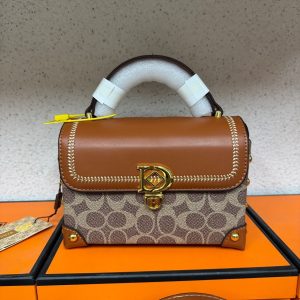 Coach Monogram Canvas Handbag – Signature Style with Gold Clasp